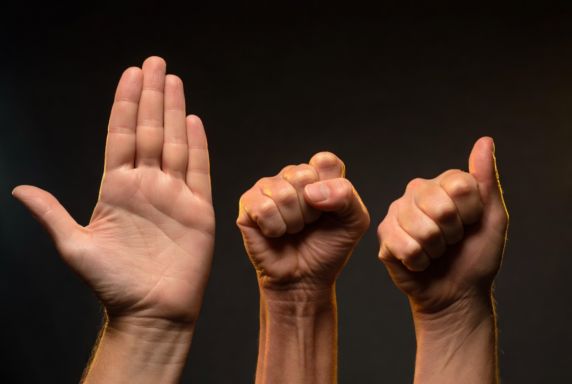 Hands demonstrating portion control - palm fist thumb method